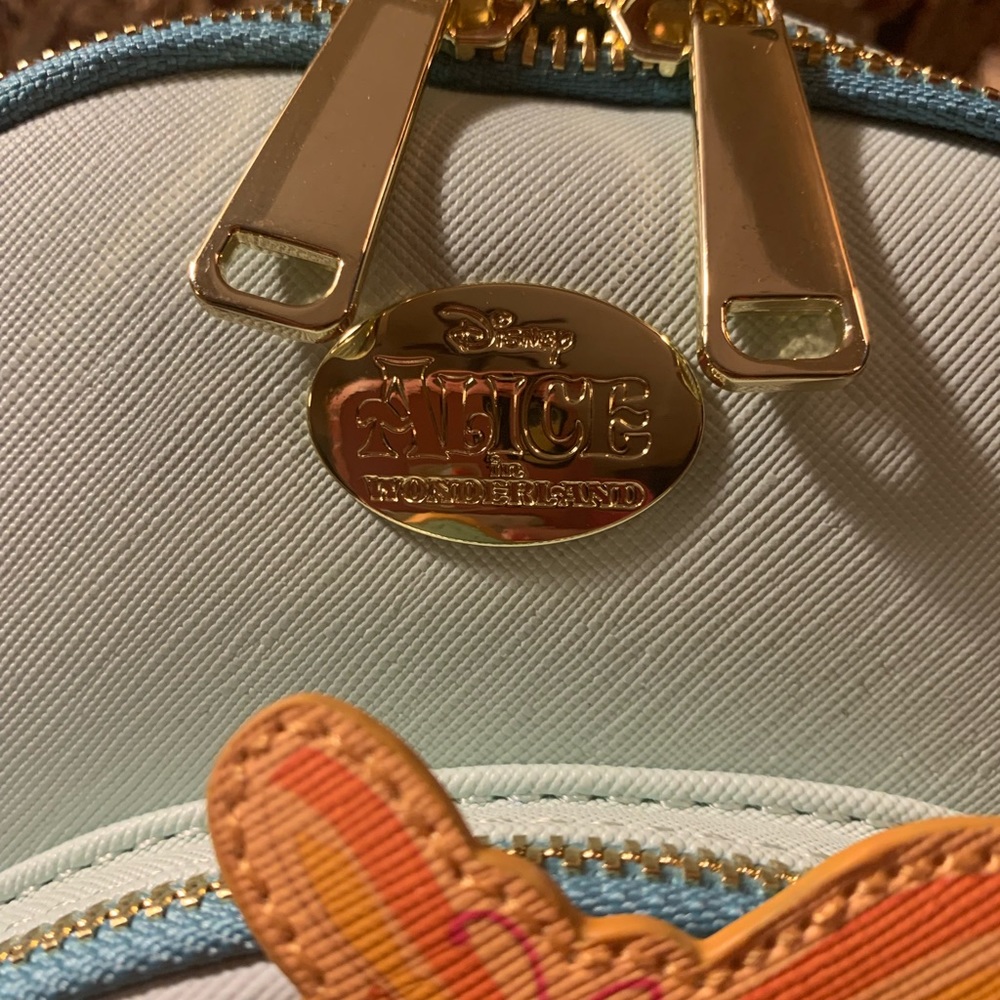 SOLD NWT Disney Alice in Wonderland Backpack. Reg $74.90 - Picture 3 of 8